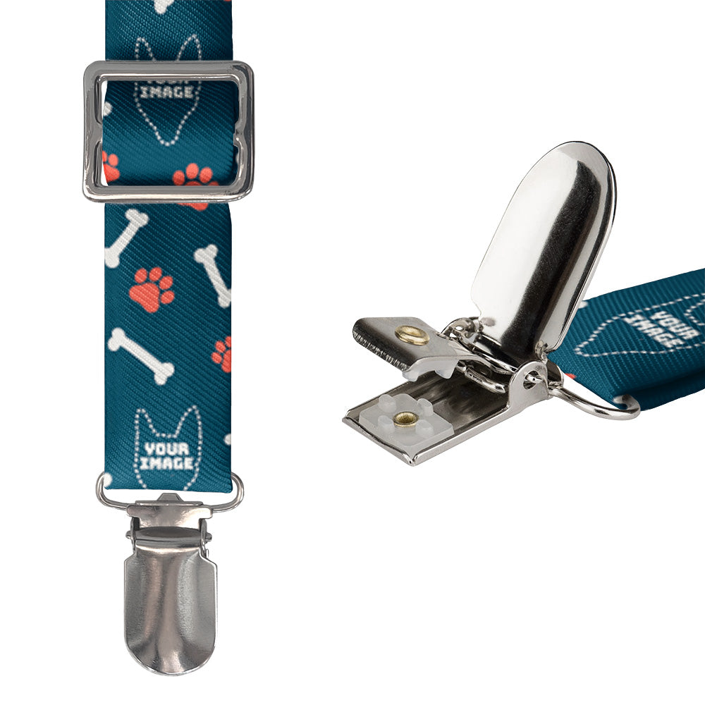 Dog-themed suspenders with blue patterned strap and metal clasp on a white background