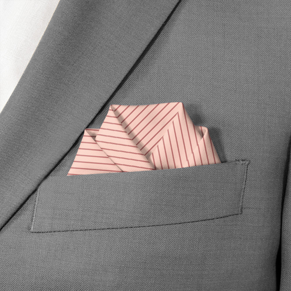 Pink striped pocket square in a gray suit pocket