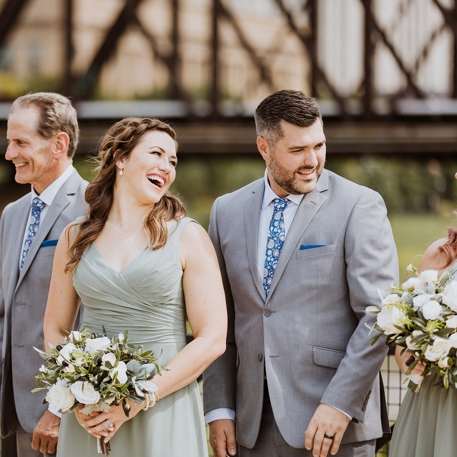 bridesmaid and groomsman in coordinated attire at wedding