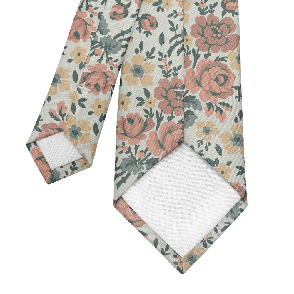 Back view of a floral patterned tie with a white shirt background