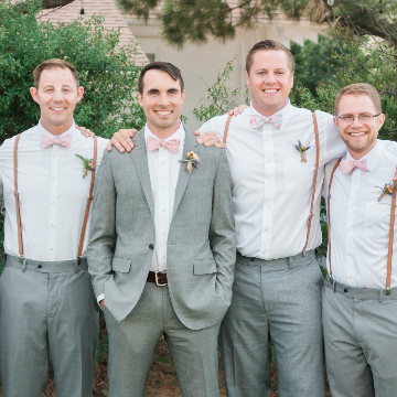 men wearing bow ties at a wedding