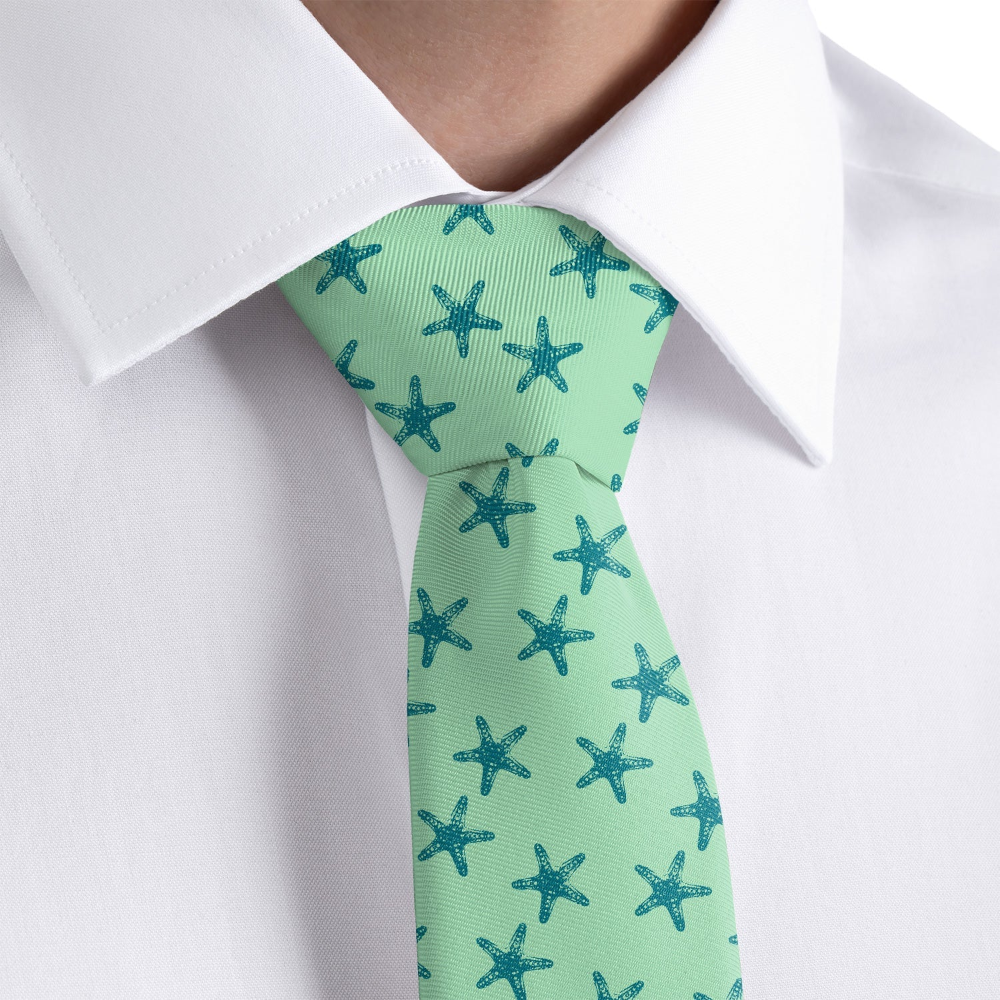 close up of a nautical themed tie and a white shirt