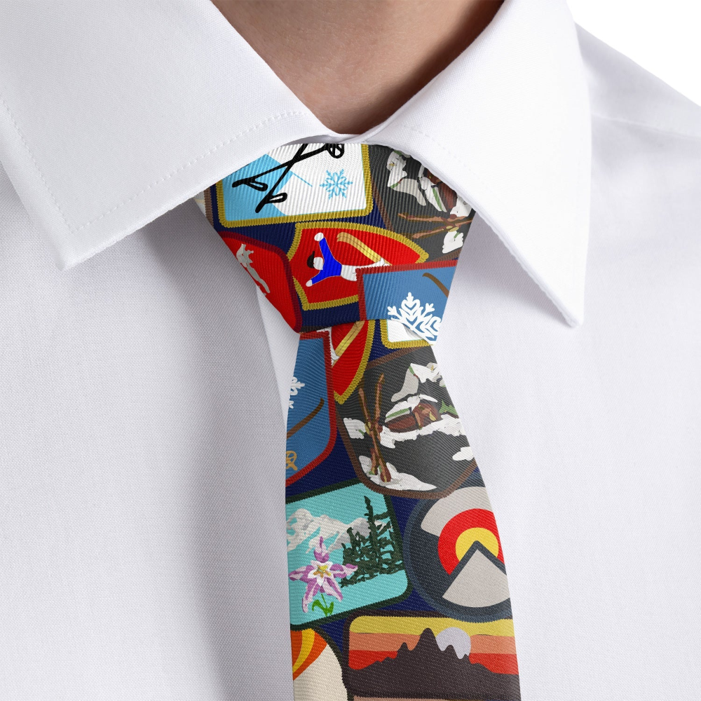 close up of a ski-themed tie design and a white shirt