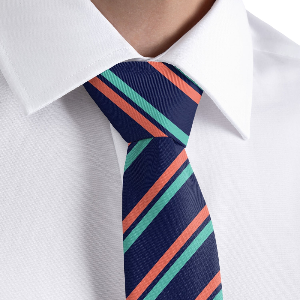 close up of a striped tie and a white shirt 